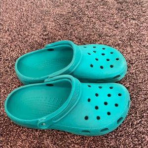 Turquoise crocs